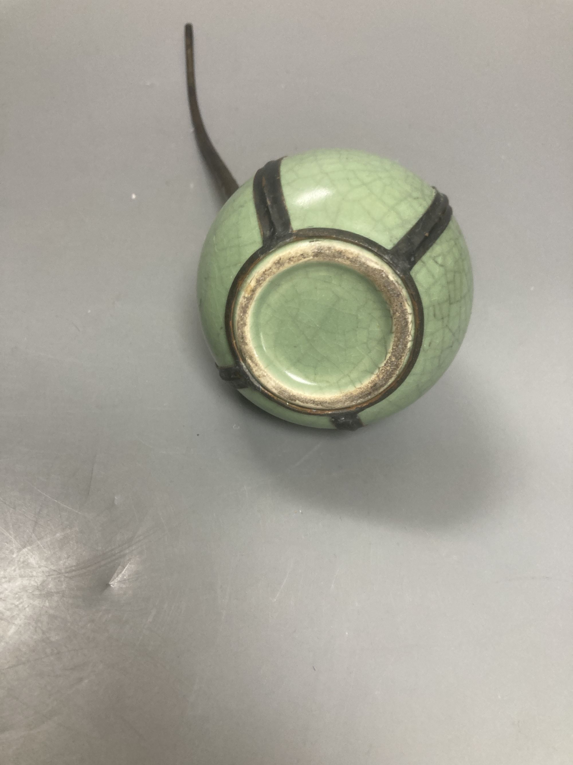 A Chinese celadon glazed water pipe and another 20cm total